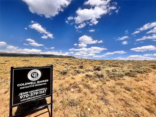 a view of a lake with a sunset