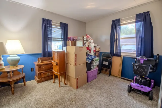 a room with furniture and a window