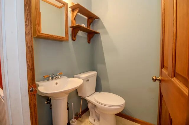 a bathroom with a sink and a toilet