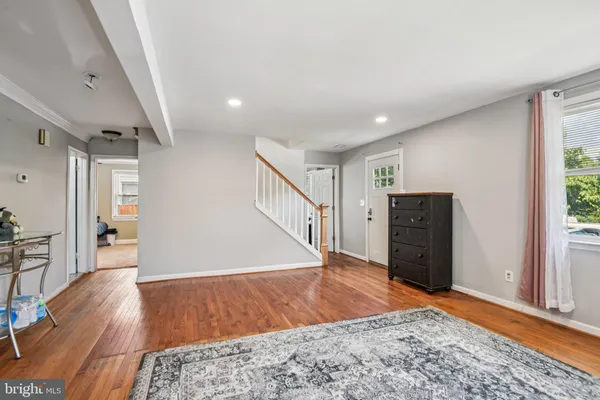 a view of a livingroom with wooden floor