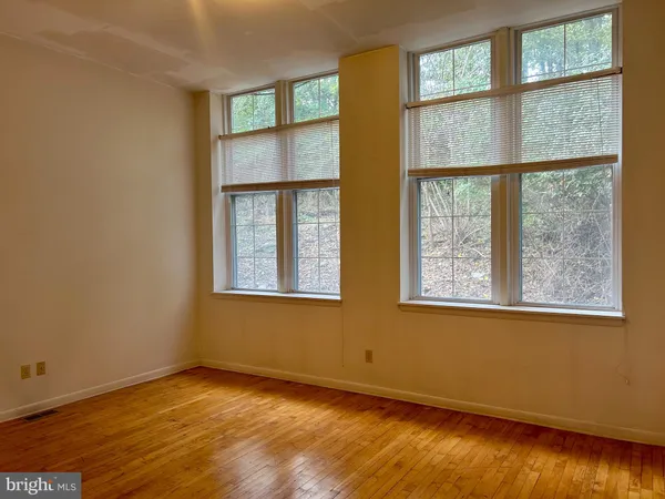 an empty room with a window