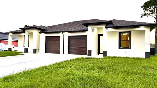 a house view with a garden space