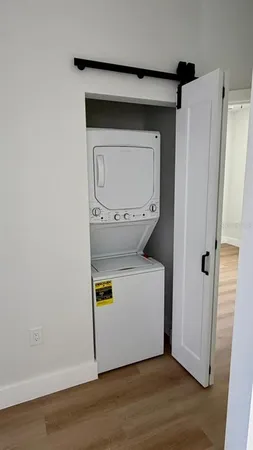 a utility room with washer and dryer