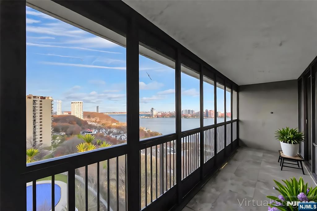 5 Horizon Road, Unit 907 Fort Lee, NJ 07024 - Photo 2 of 47 a view of city with stairs
