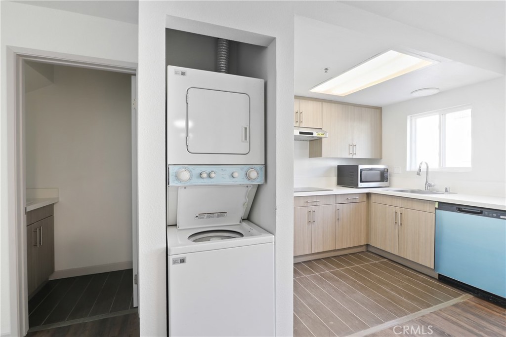 112 North Primrose Avenue, Unit C Alhambra, CA 91801 - Photo 4 of 8 a kitchen with a refrigerator sink and cabinets