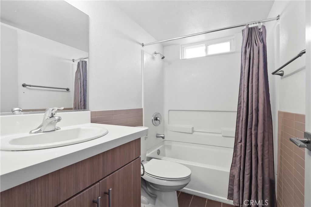 112 North Primrose Avenue, Unit C Alhambra, CA 91801 - Photo 6 of 8 a bathroom with a sink toilet and shower
