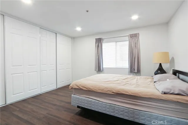 a view of a white building among the street