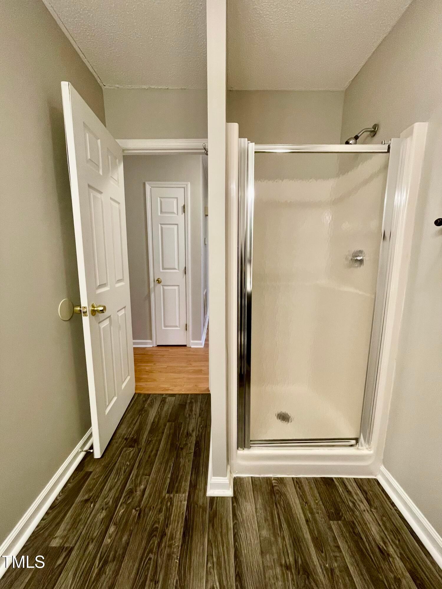 4114 Beechnut Lane Durham, NC 27707 - Photo 14 of 25 a view of a bathroom with wooden floor and a window