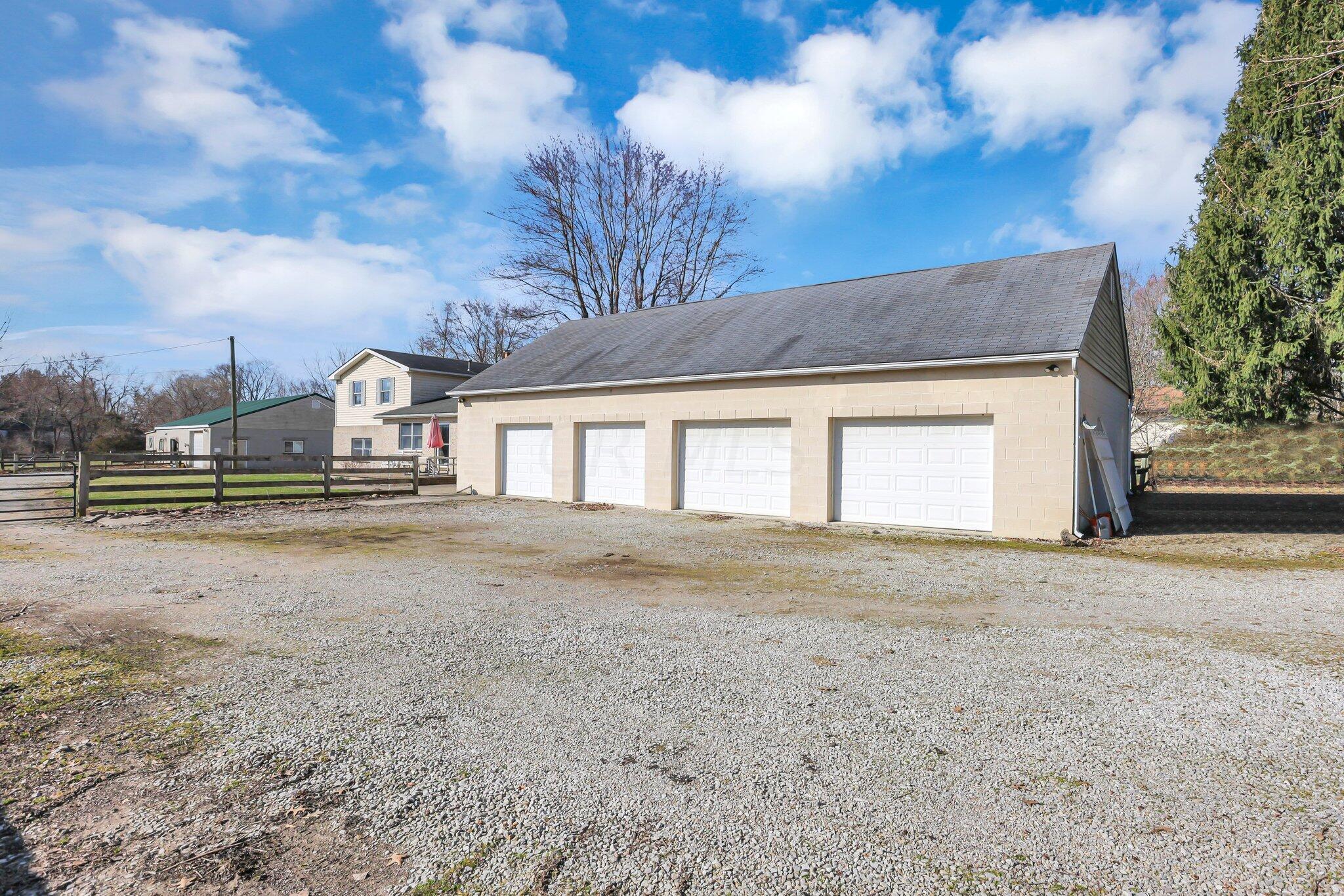 5225 Deeds Road Southwest Pataskala, OH 43062 - Photo 4 of 43 4 car detached garage