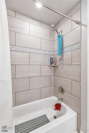 a bathroom with a bathtub