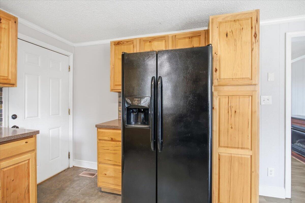 1249 Blue Ridge Turnpike Fincastle, VA 24090 - Photo 14 of 29 a bathroom with a refrigerator and a sink