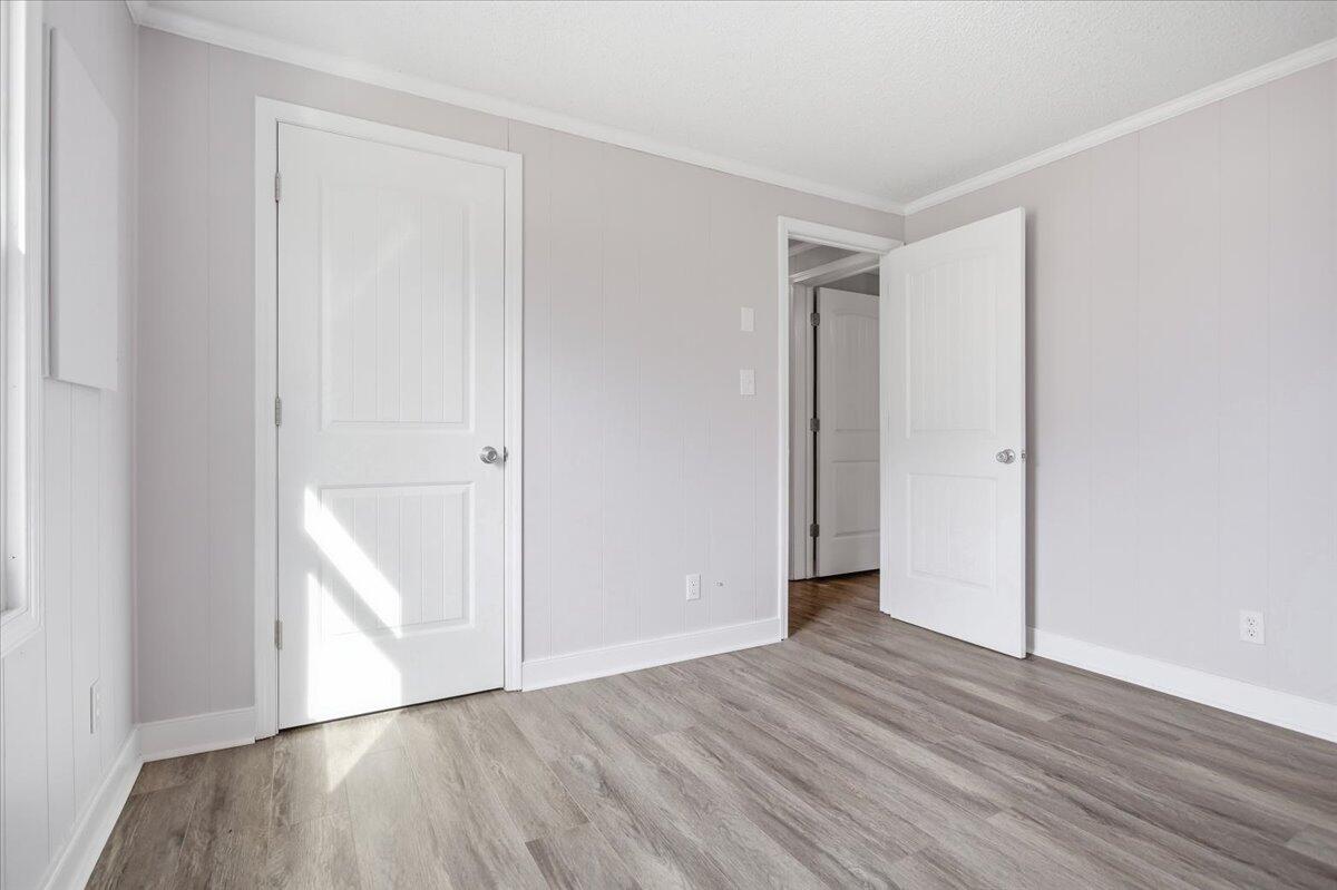1249 Blue Ridge Turnpike Fincastle, VA 24090 - Photo 21 of 29 a view of an empty room with wooden floor