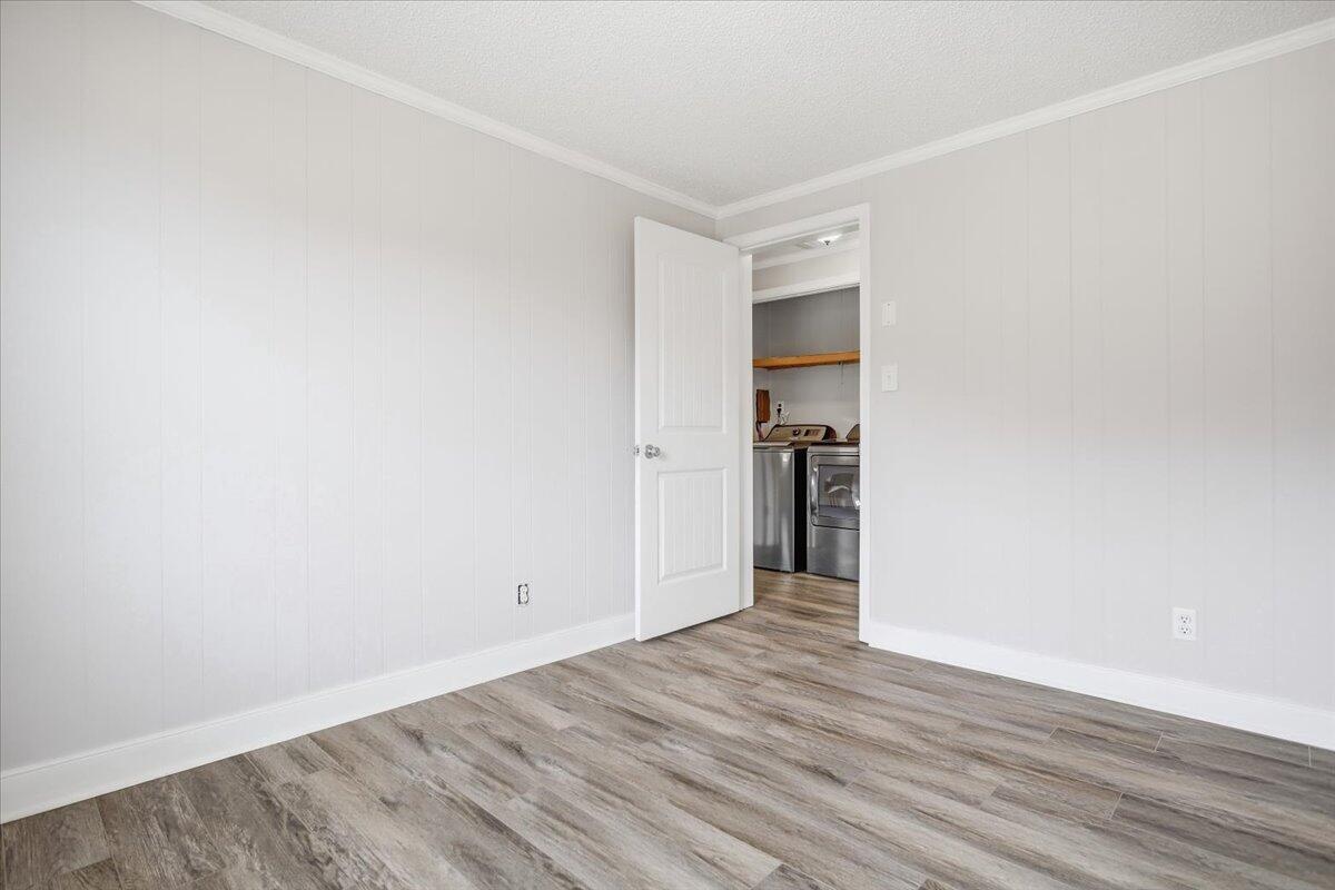 1249 Blue Ridge Turnpike Fincastle, VA 24090 - Photo 25 of 29 a view of an empty room with wooden floor and closet