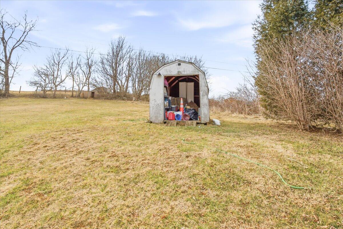 1249 Blue Ridge Turnpike Fincastle, VA 24090 - Photo 27 of 29 a swimming pool with outdoor seating and yard