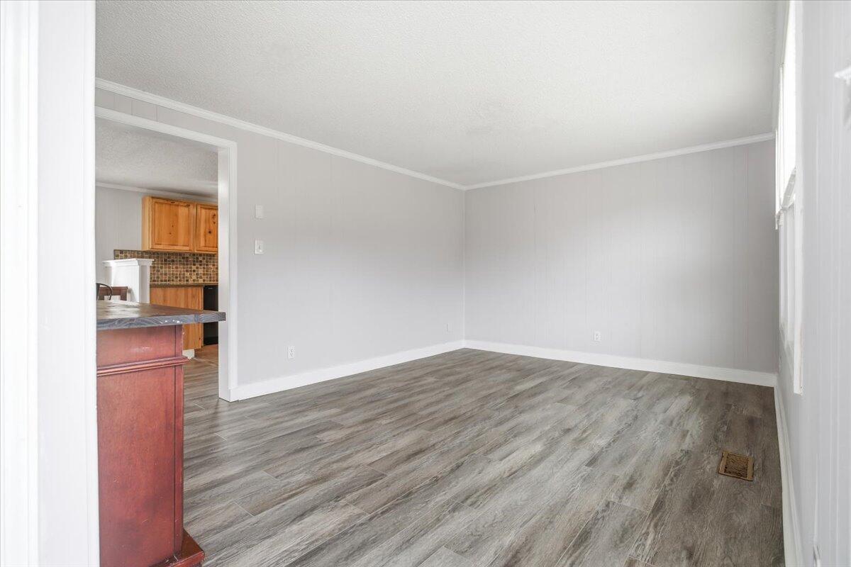 1249 Blue Ridge Turnpike Fincastle, VA 24090 - Photo 5 of 29 a view of empty room with wooden floor
