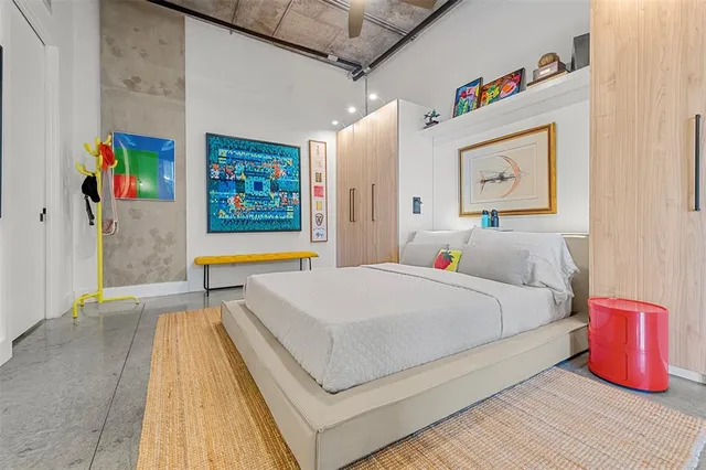 a bathroom with a toilet a sink and a mirror