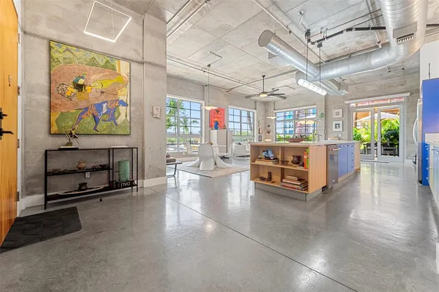 a living room with fireplace furniture and a flat screen tv