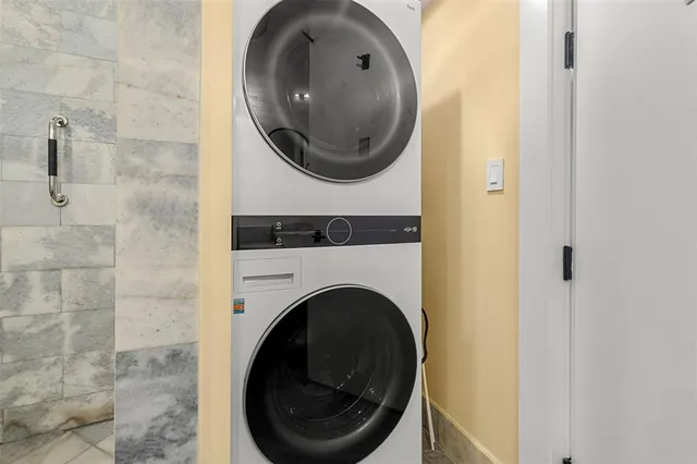 a swimming pool with outdoor seating and yard