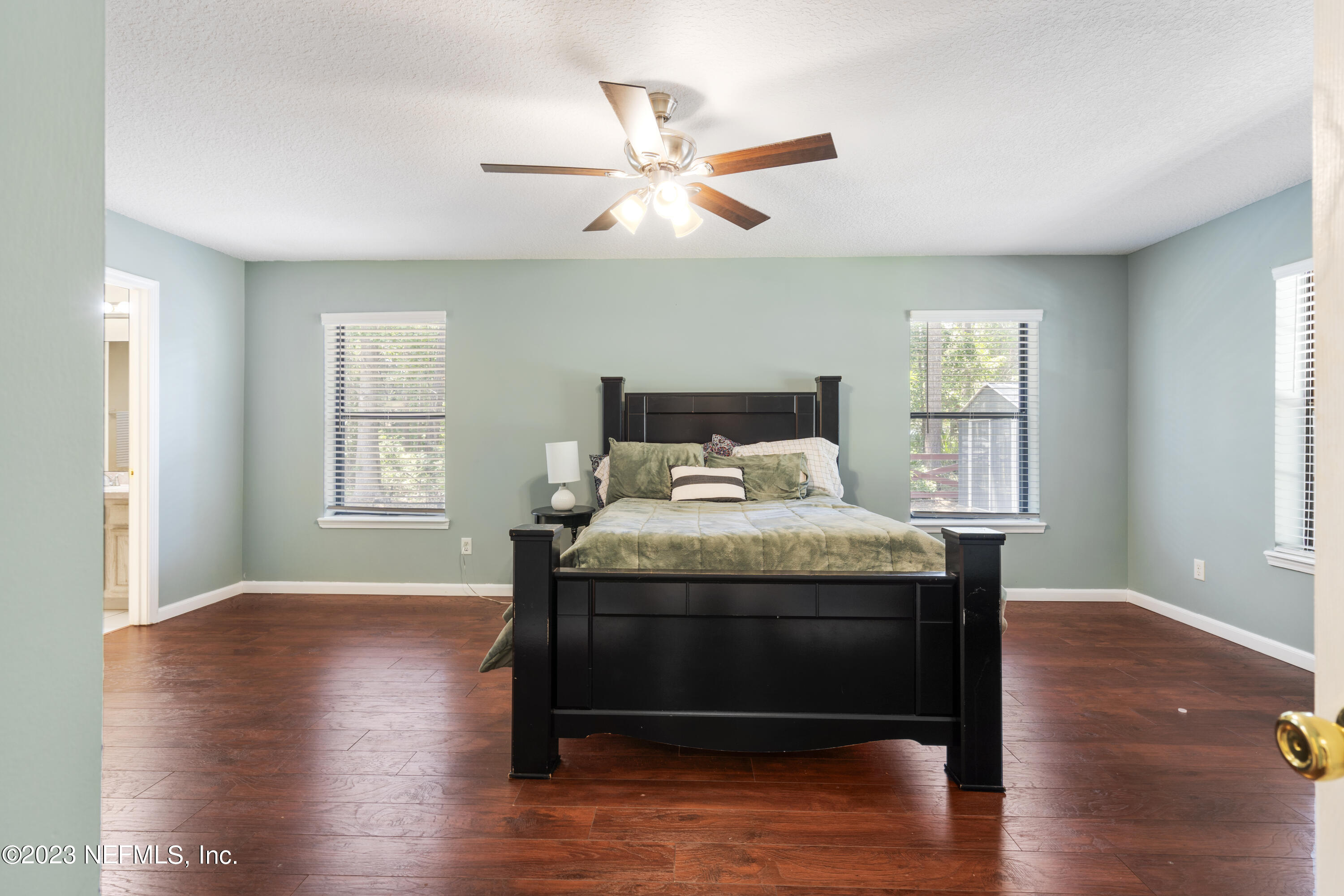 870 Fleming Street Fleming Island, FL 32003 - Photo 29 of 48 a bedroom with a bed and window