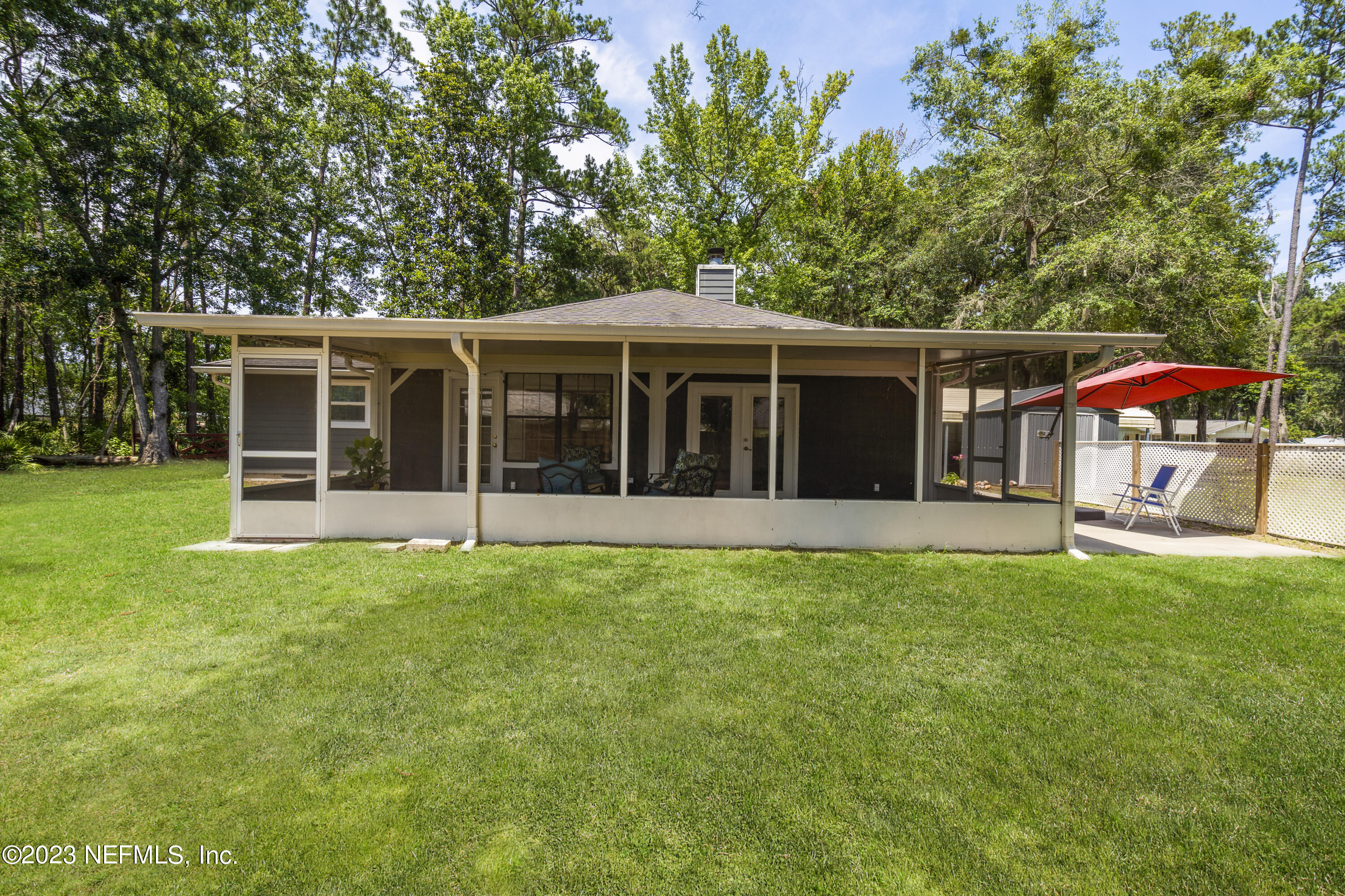 870 Fleming Street Fleming Island, FL 32003 - Photo 36 of 48 a house view with a garden space
