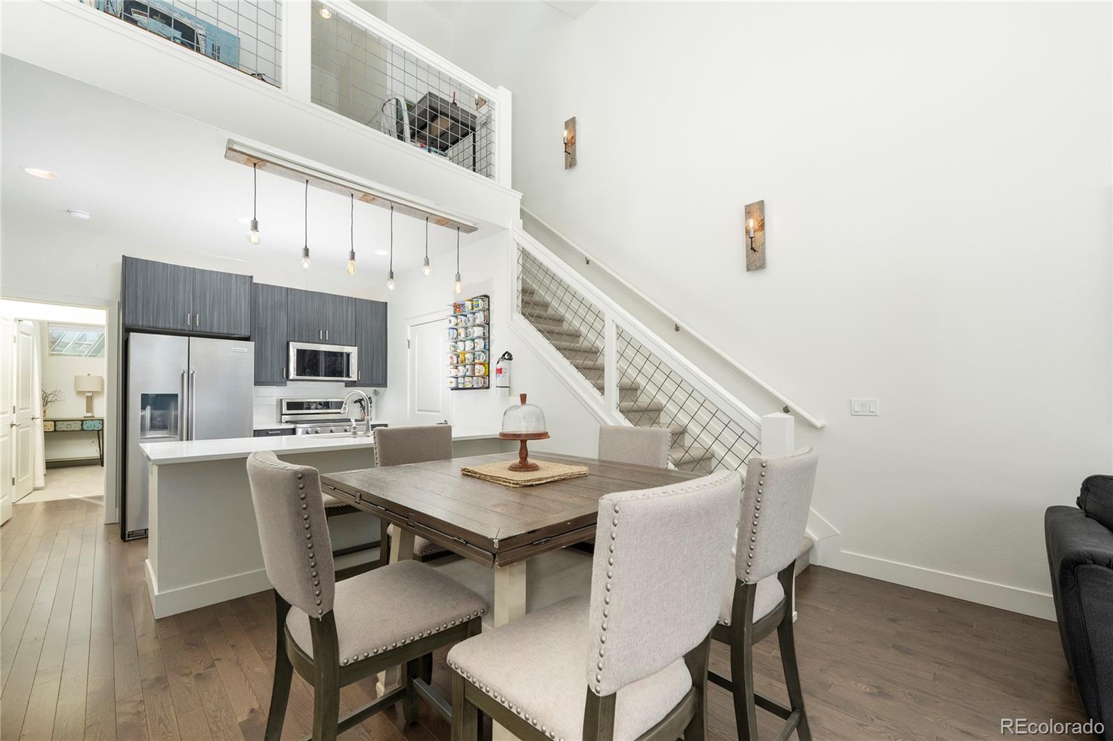 40 Journey Way Fraser, CO 80442 - Photo 11 of 41 a view of a dining room with furniture and wooden floor