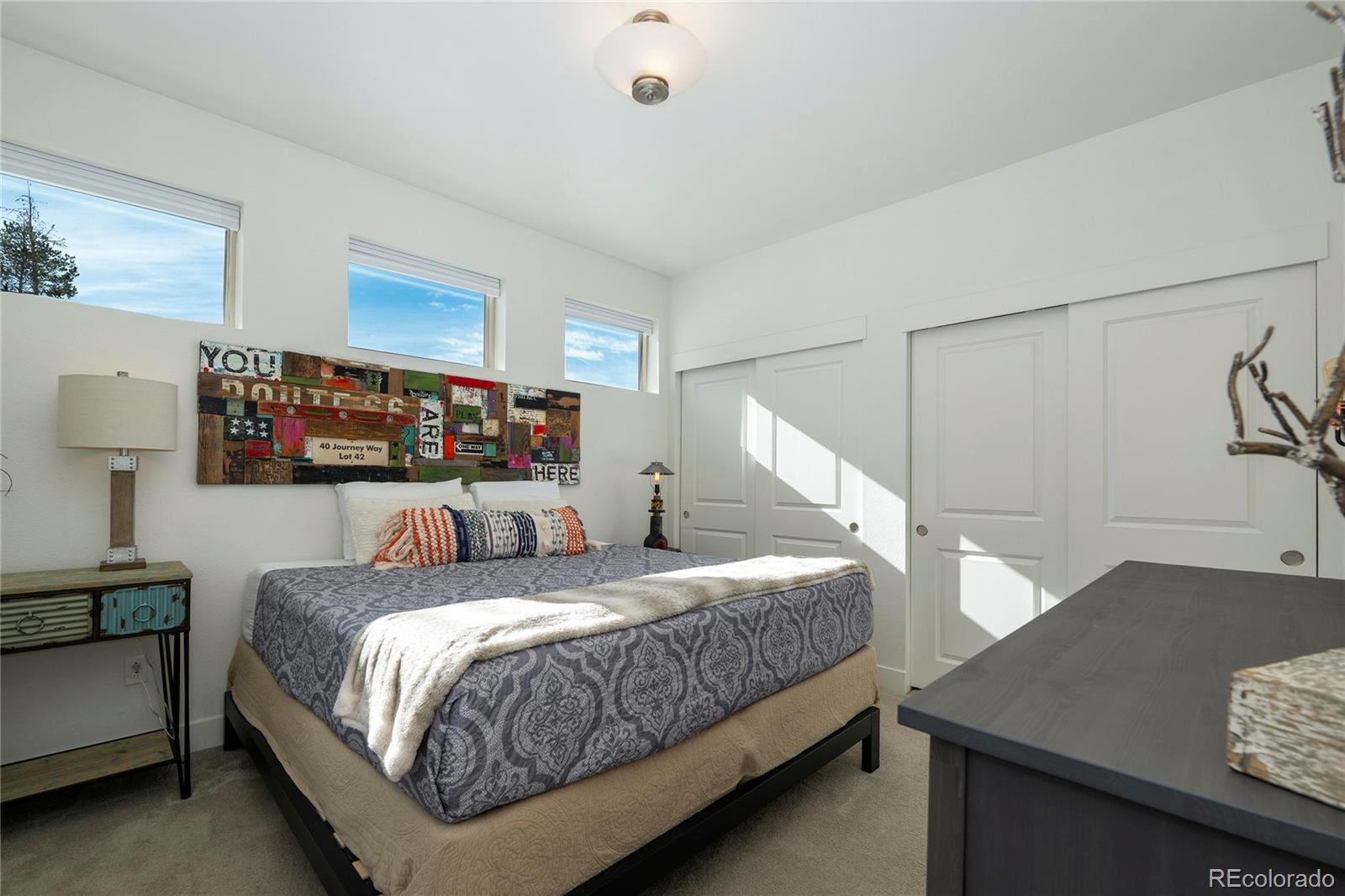 40 Journey Way Fraser, CO 80442 - Photo 13 of 41 a bedroom with a bed and window
