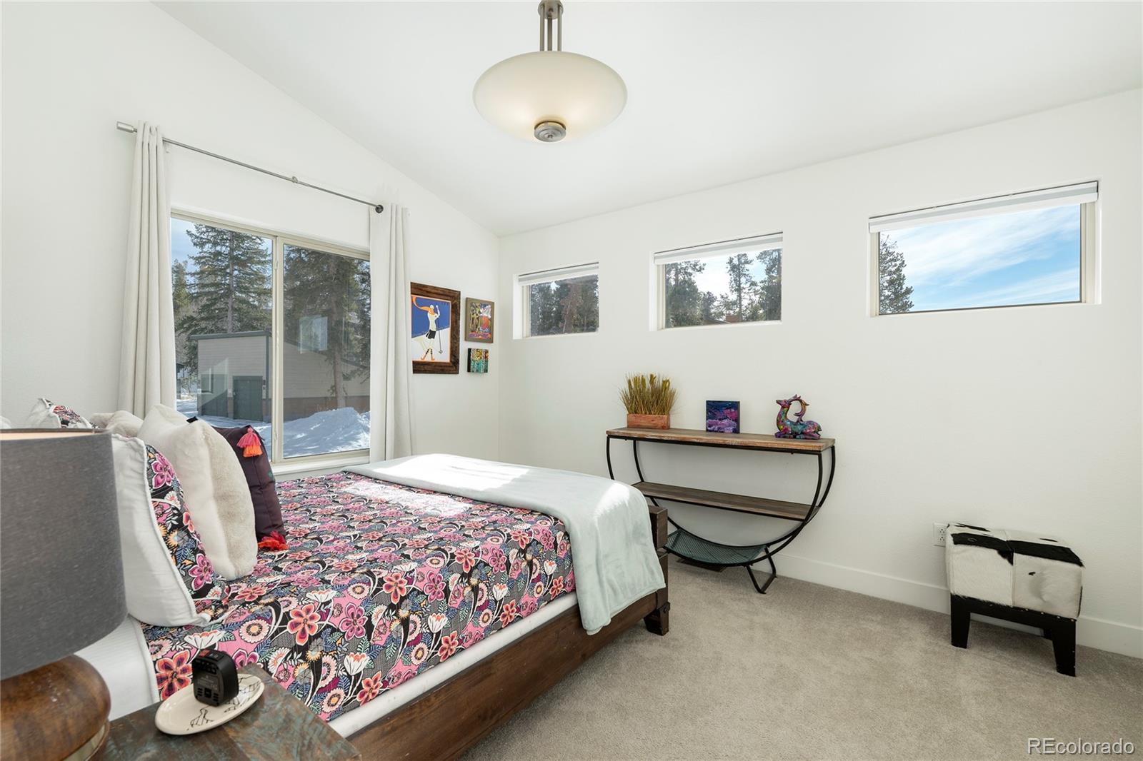 40 Journey Way Fraser, CO 80442 - Photo 20 of 41 a bedroom with bed and a window