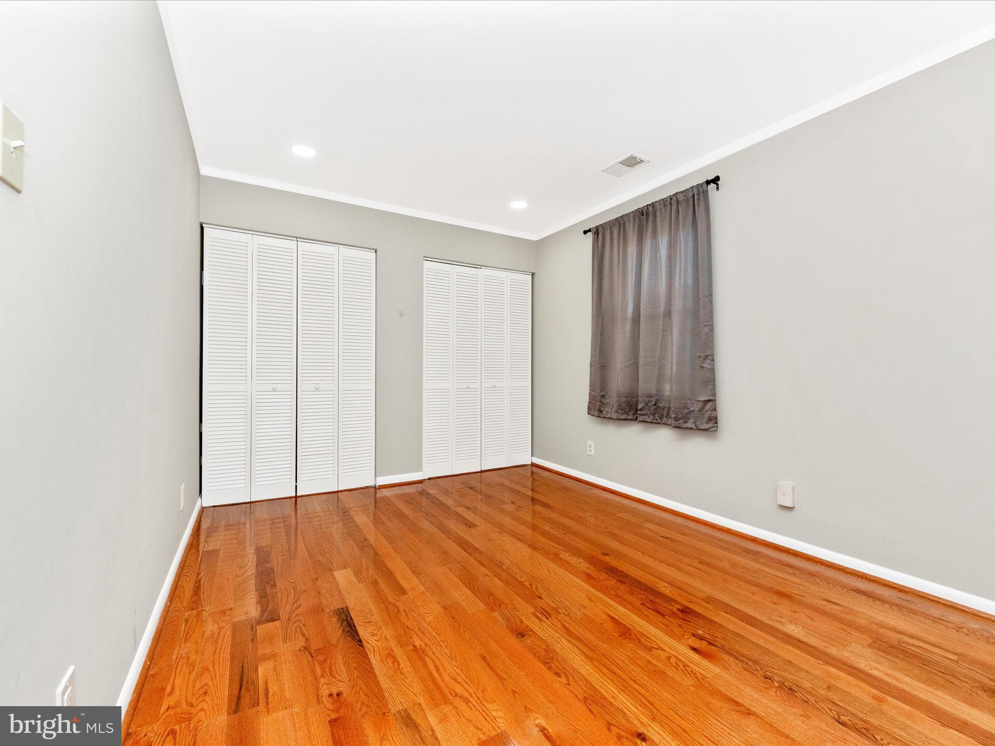 1203 North Point Road Dundalk, MD 21222 - Photo 11 of 42 a view of empty room with wooden floor