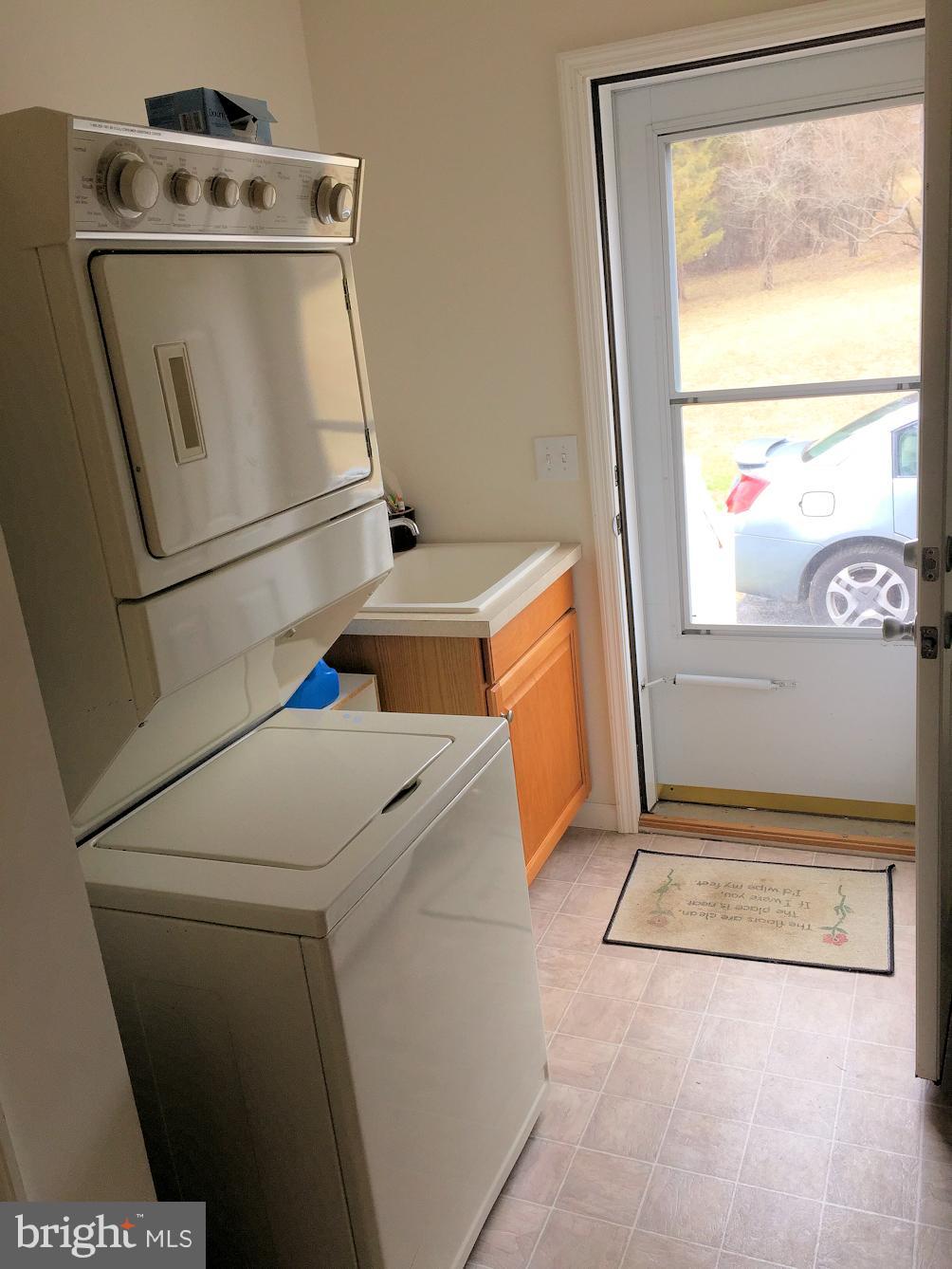 2441 Ridge Road Baltimore, MD 21244 - Photo 15 of 19 a utility room with dryer and washer