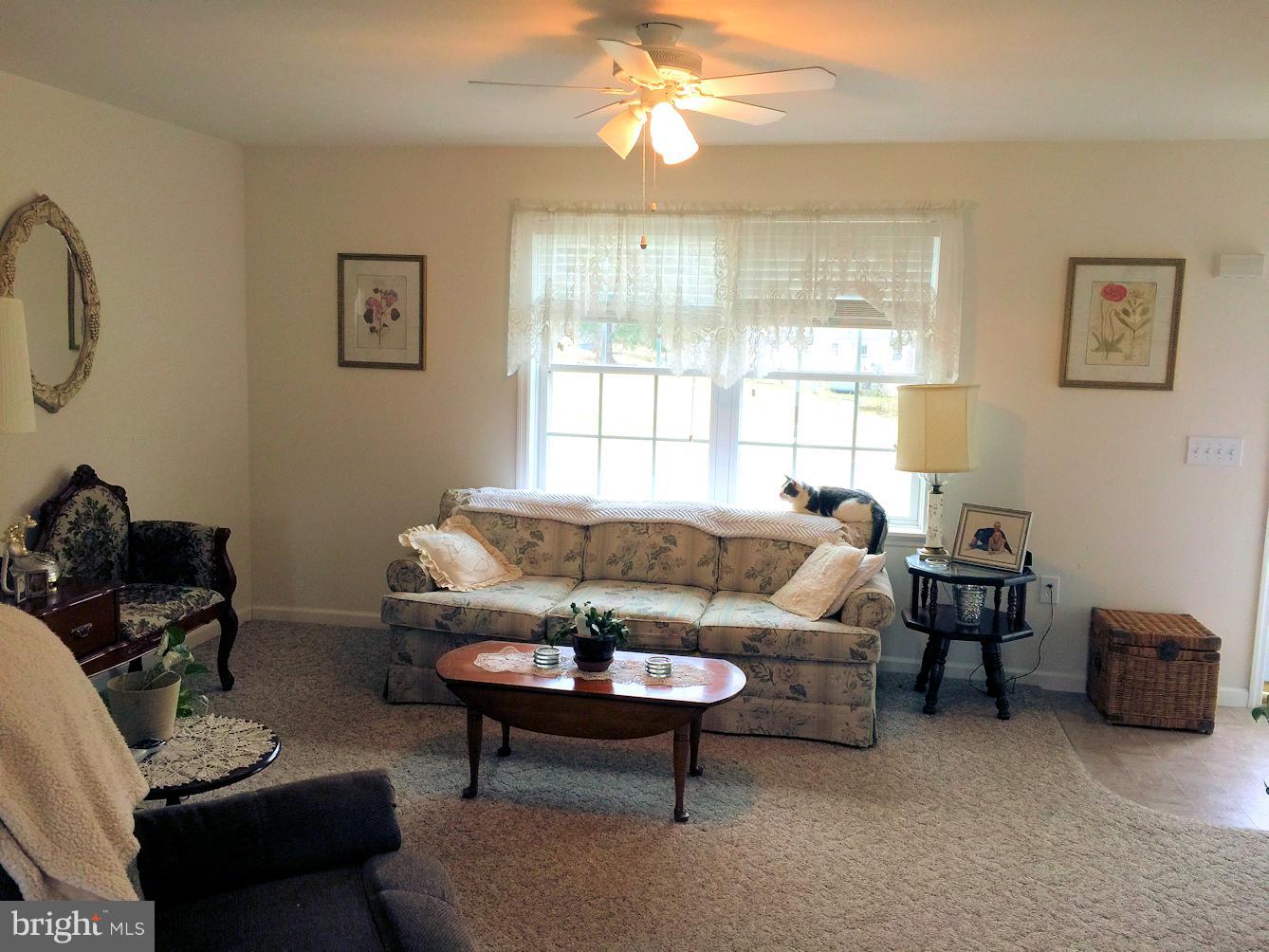 2441 Ridge Road Baltimore, MD 21244 - Photo 3 of 19 a living room with furniture and a window