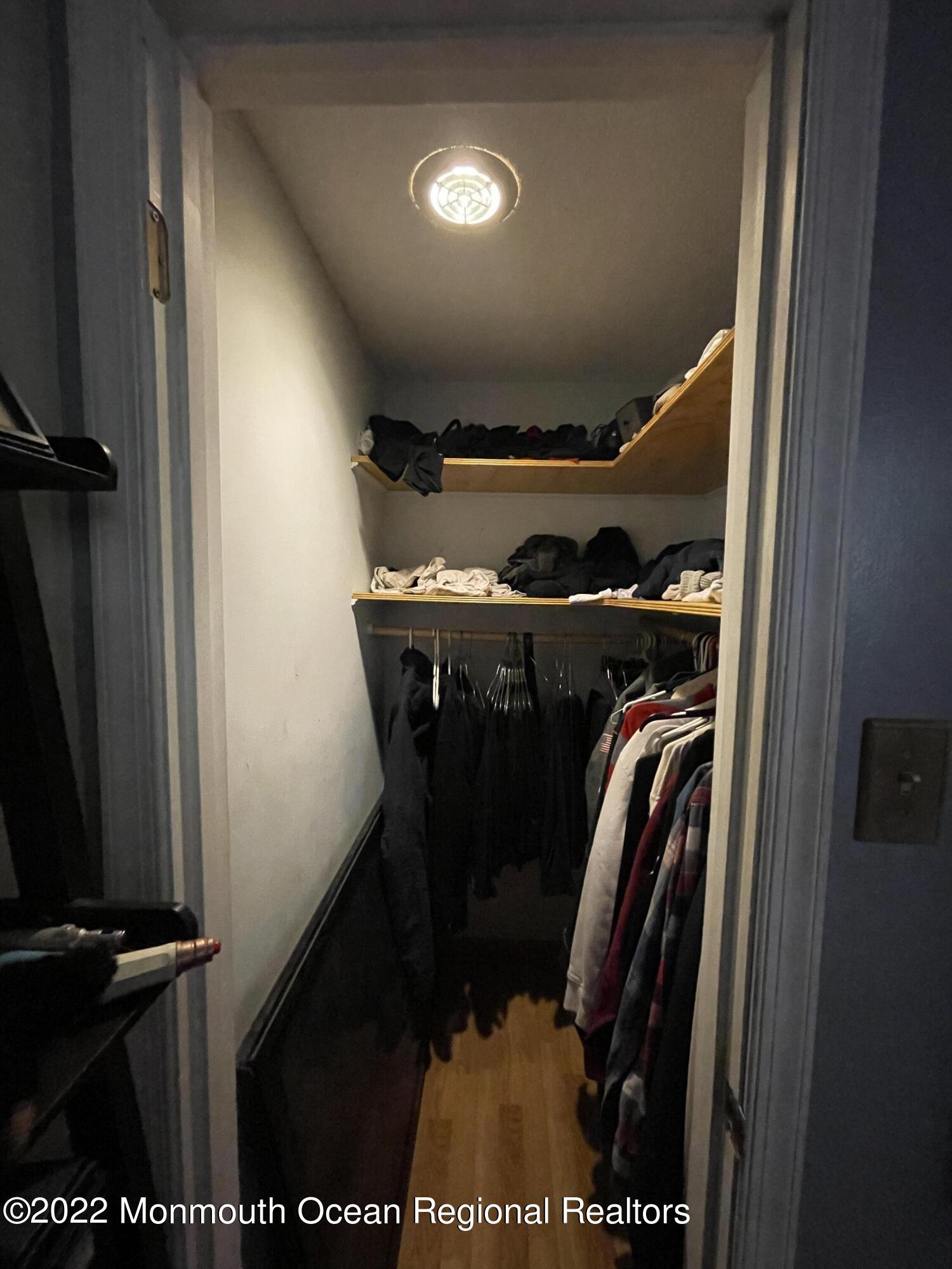 330 Ridge Road Browns Mills, NJ 08015 - Photo 15 of 33 a view of walk in closet with clothes and shoes