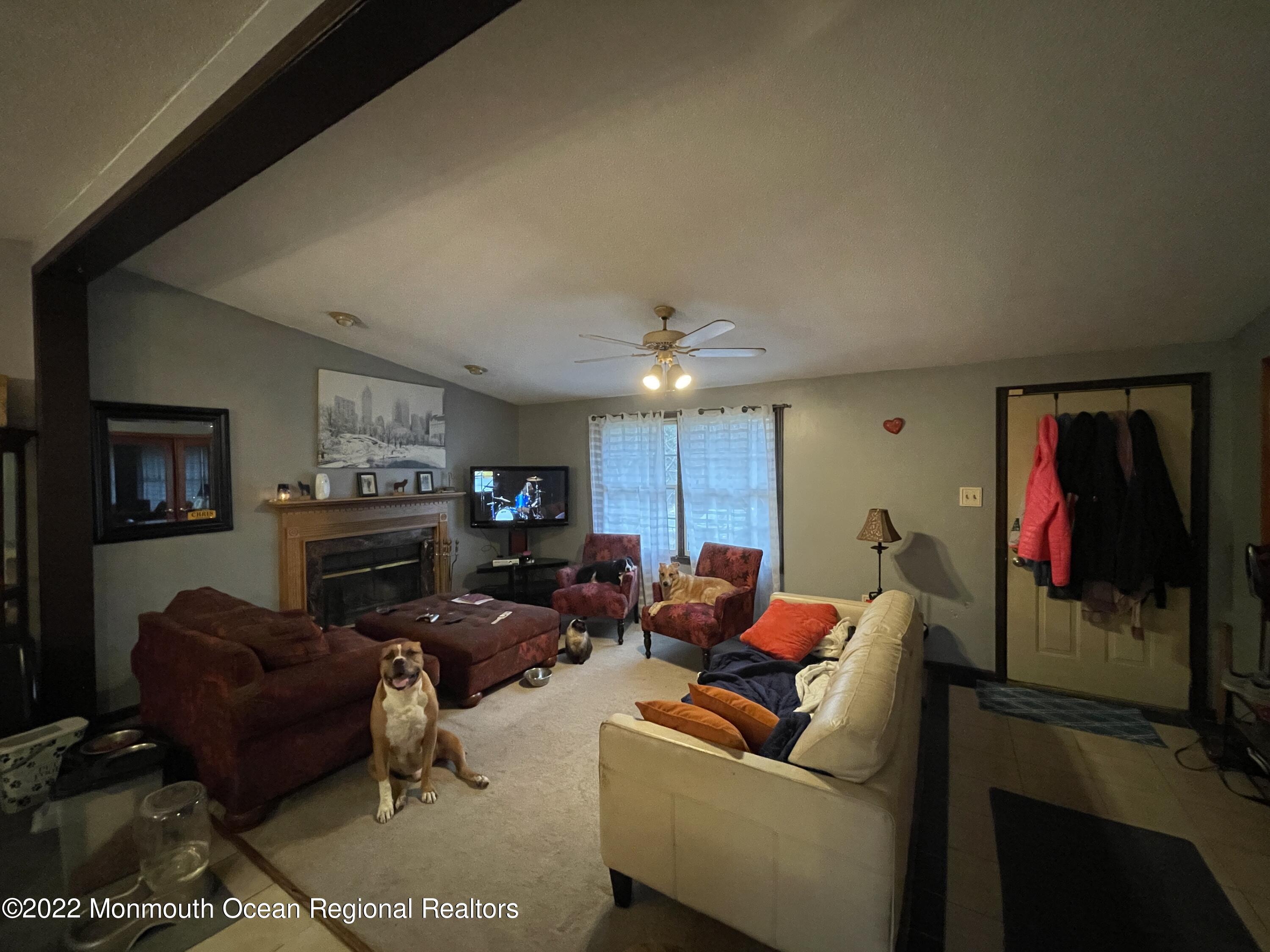 330 Ridge Road Browns Mills, NJ 08015 - Photo 6 of 33 a living room with furniture and a flat screen tv
