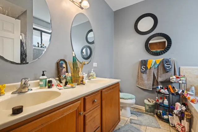 a bathroom with a tub and a sink