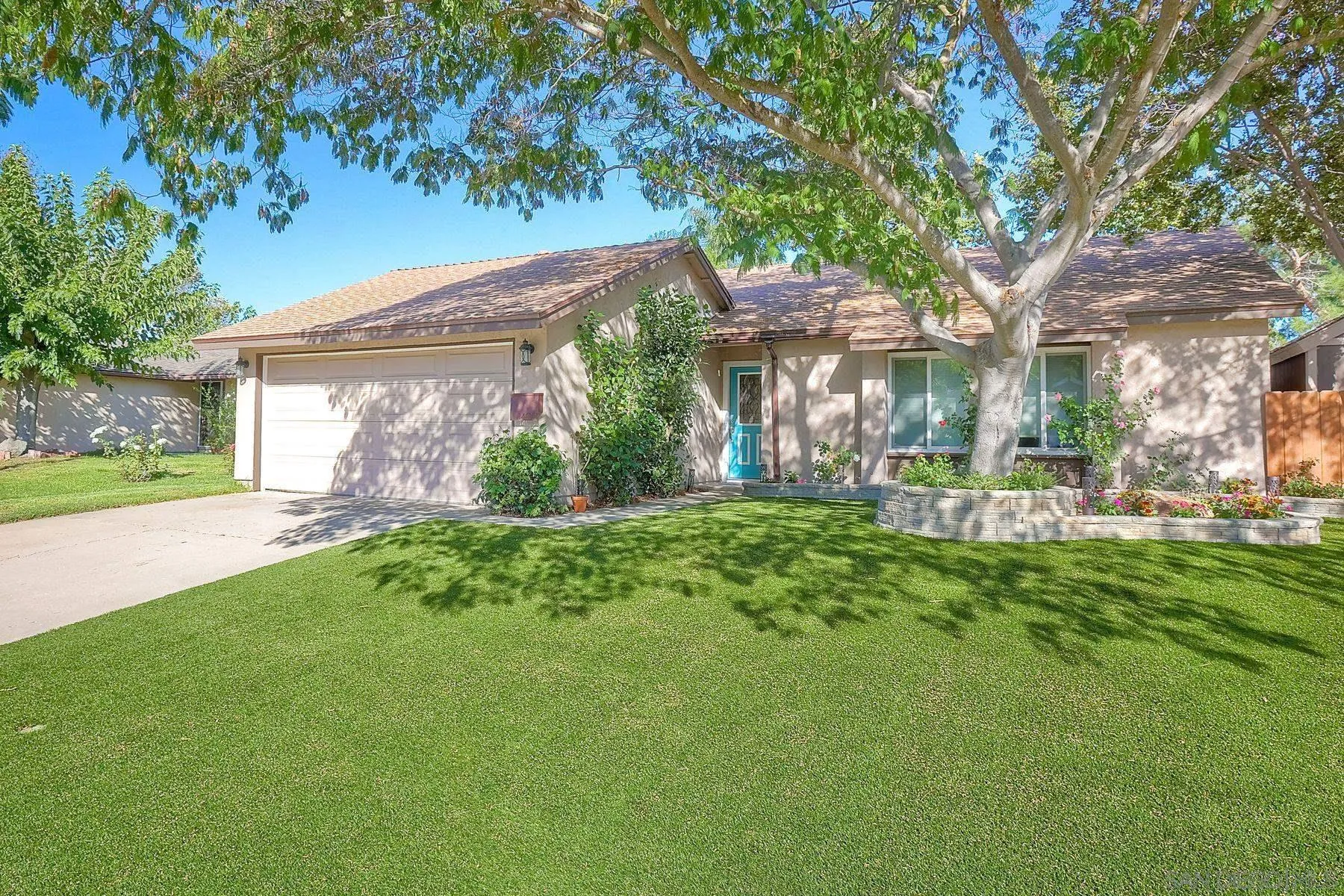 14051 Olive Meadows Place Poway, CA 92064 - Photo 2 of 33 a front view of a house with garden