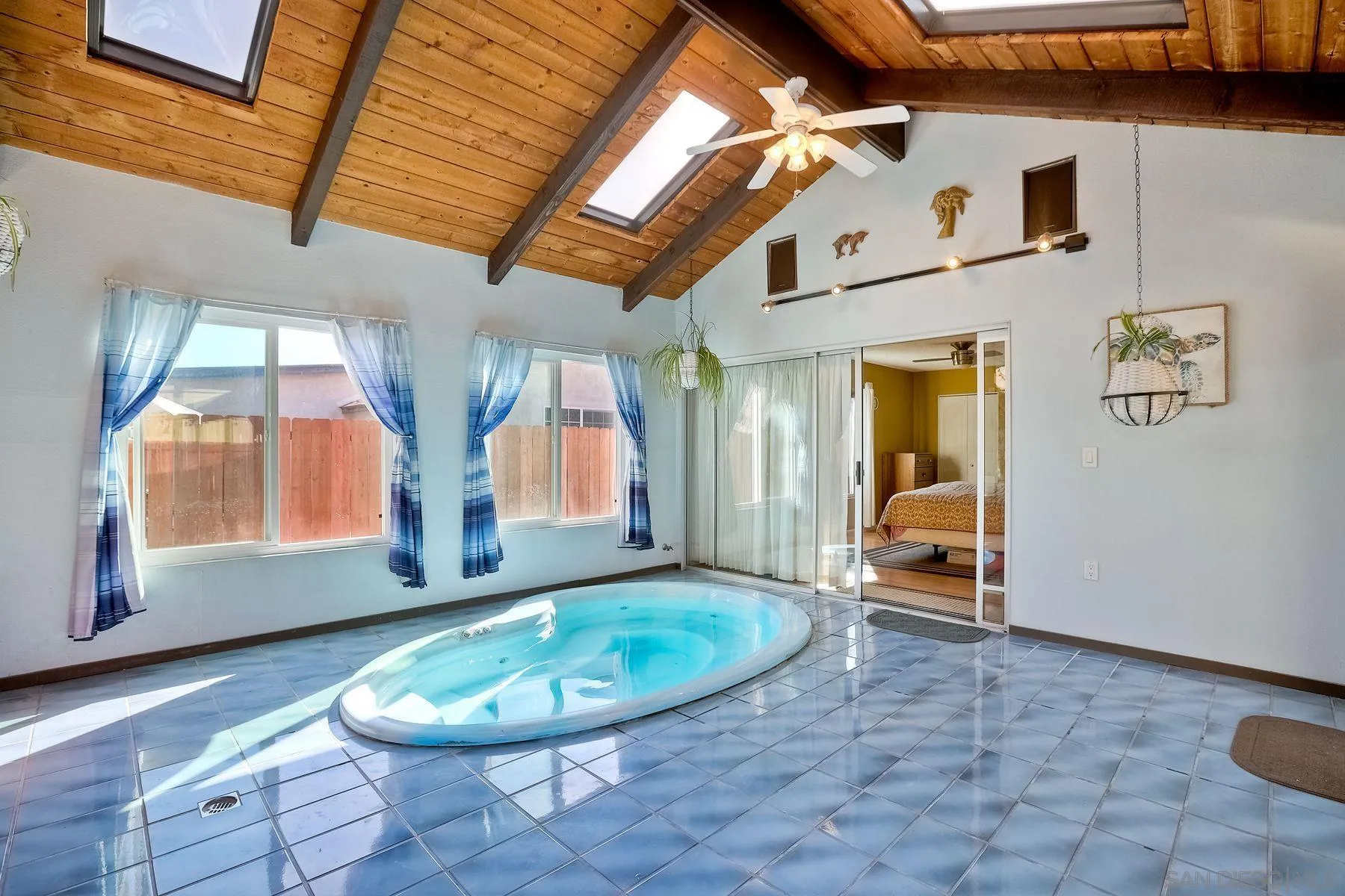 14051 Olive Meadows Place Poway, CA 92064 - Photo 23 of 33 a view of a livingroom with wooden floor and a porch