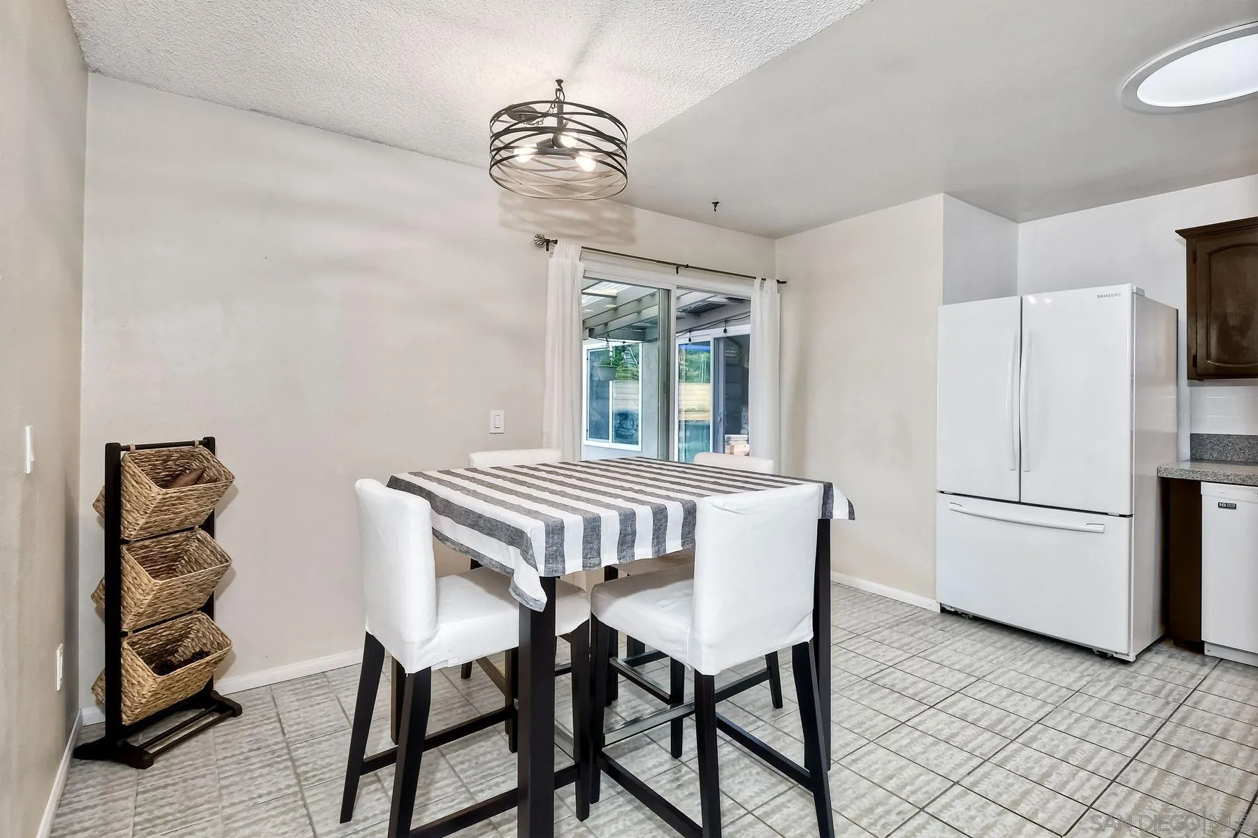 14051 Olive Meadows Place Poway, CA 92064 - Photo 8 of 33 a dining room with furniture and window