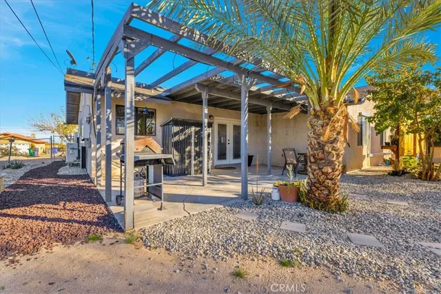 a view of a chairs and tables in patio