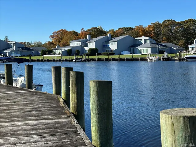 a view of a house with a yard balcony