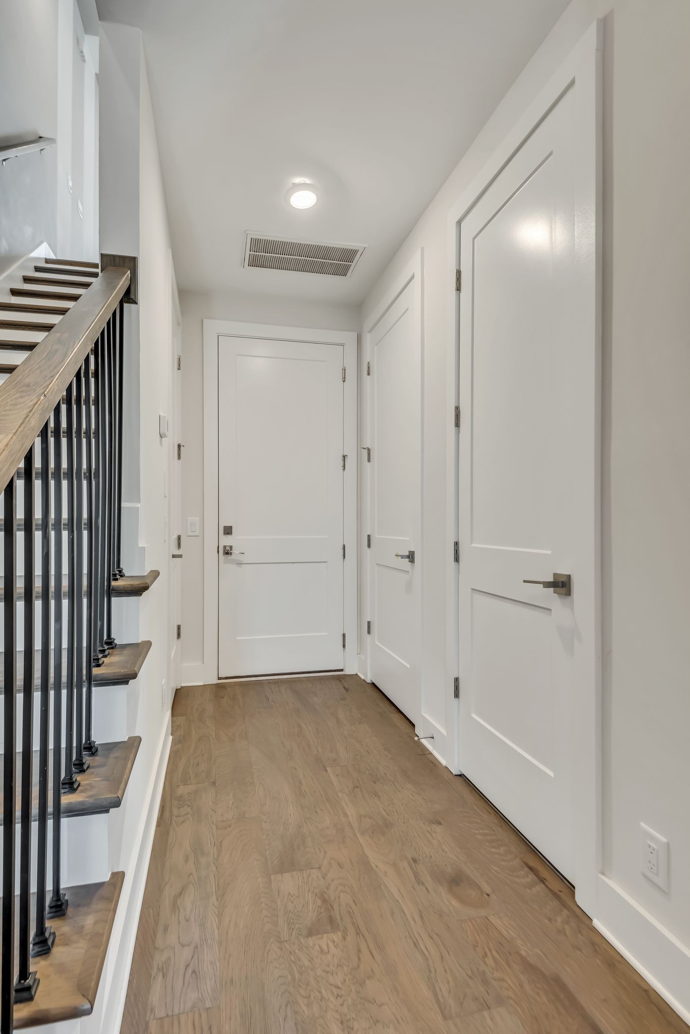 2176 Carson Street, Unit 24 Nashville, TN 37211 - Photo 11 of 36 a view of an empty room with wooden floor and entryway