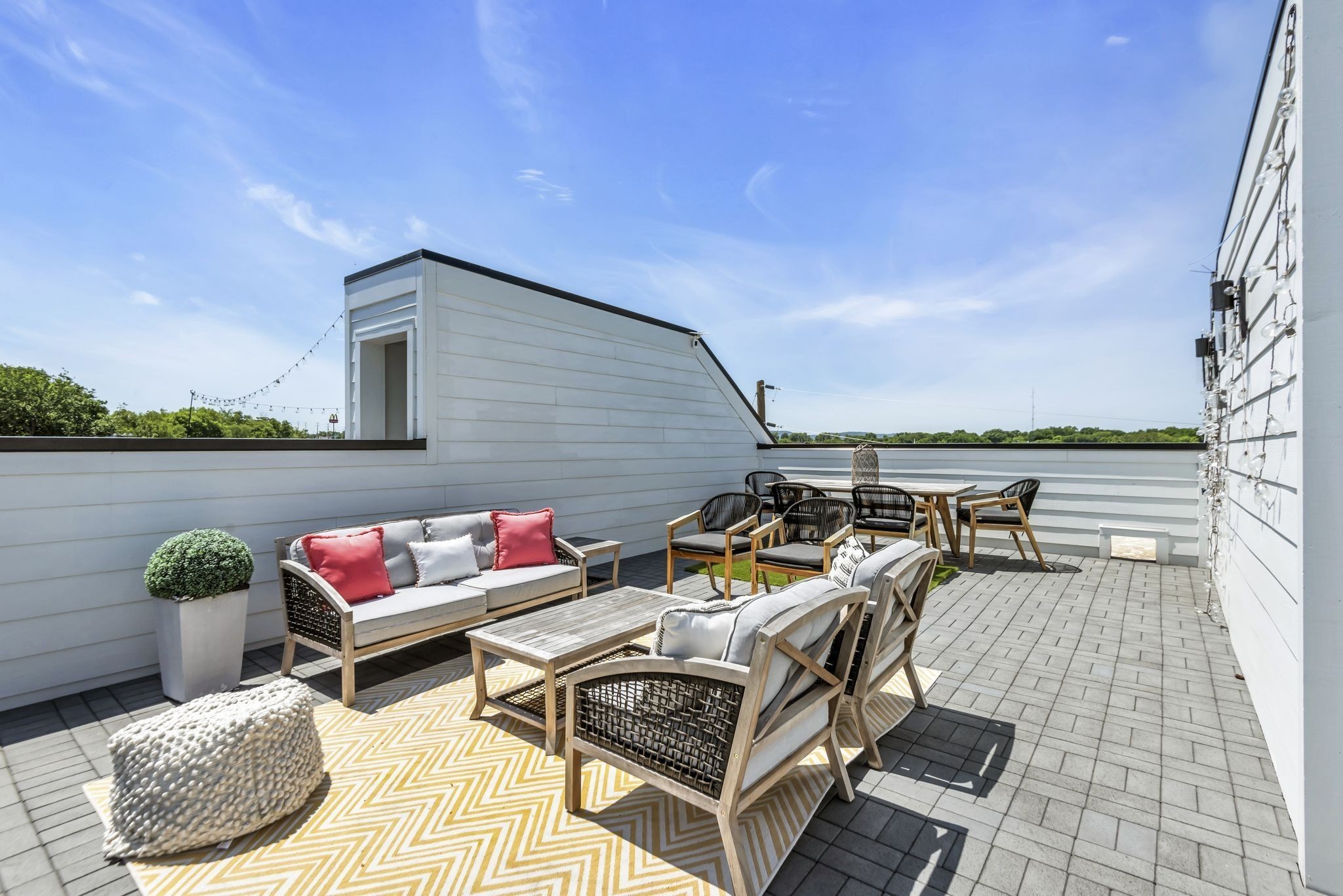 2176 Carson Street, Unit 24 Nashville, TN 37211 - Photo 6 of 36 a terrace with outdoor seating and trees