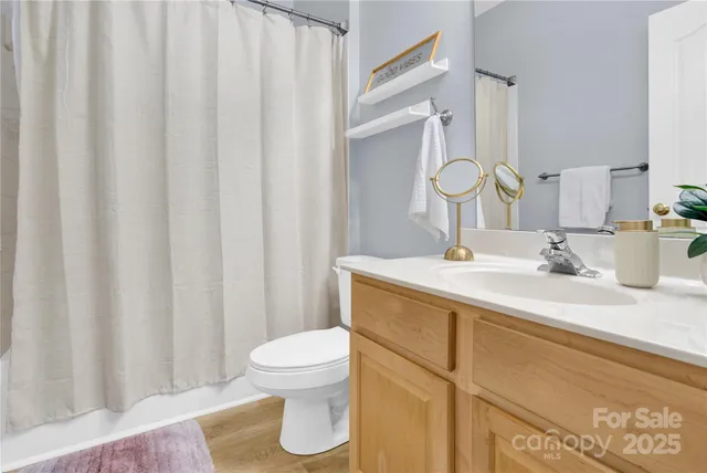 a view of a chairs and table in patio