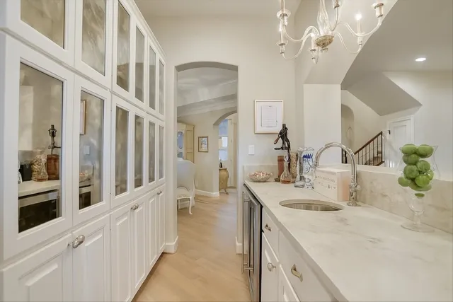 a bathroom with sinks and a large mirror