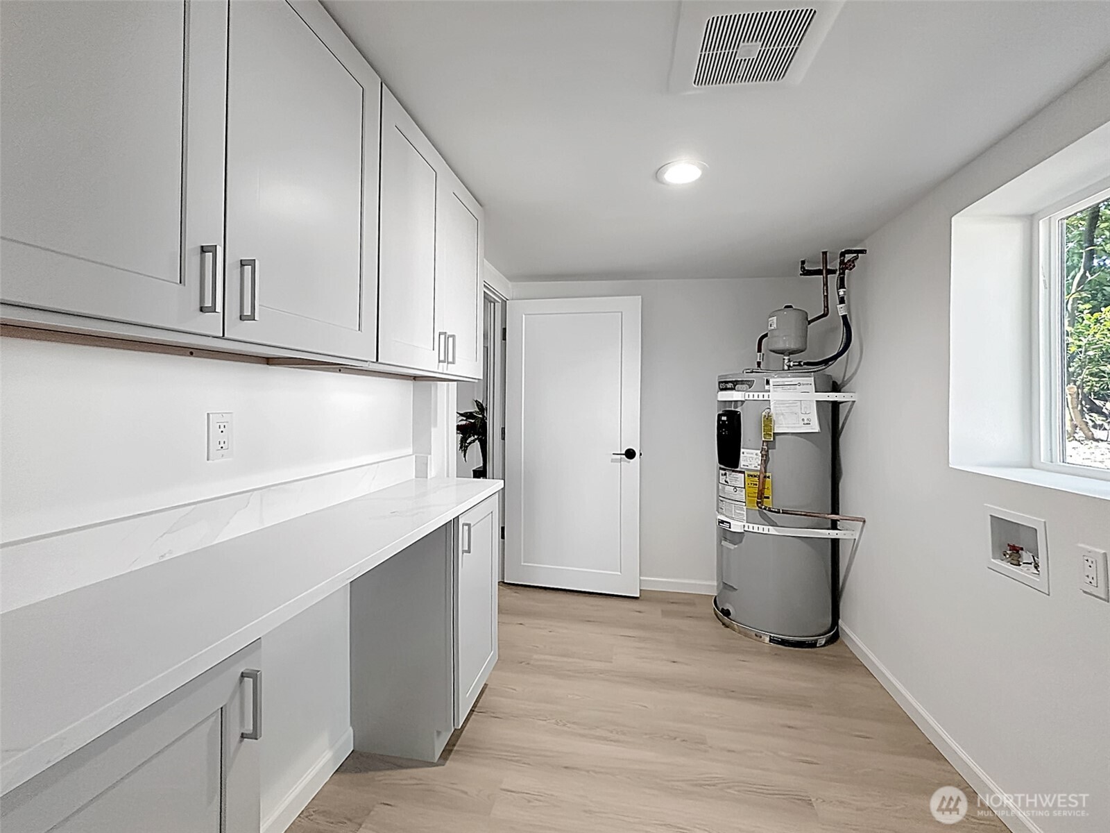 7403 Beverly Boulevard Everett, WA 98203 - Photo 11 of 19 a kitchen with stainless steel appliances granite countertop a refrigerator and a sink