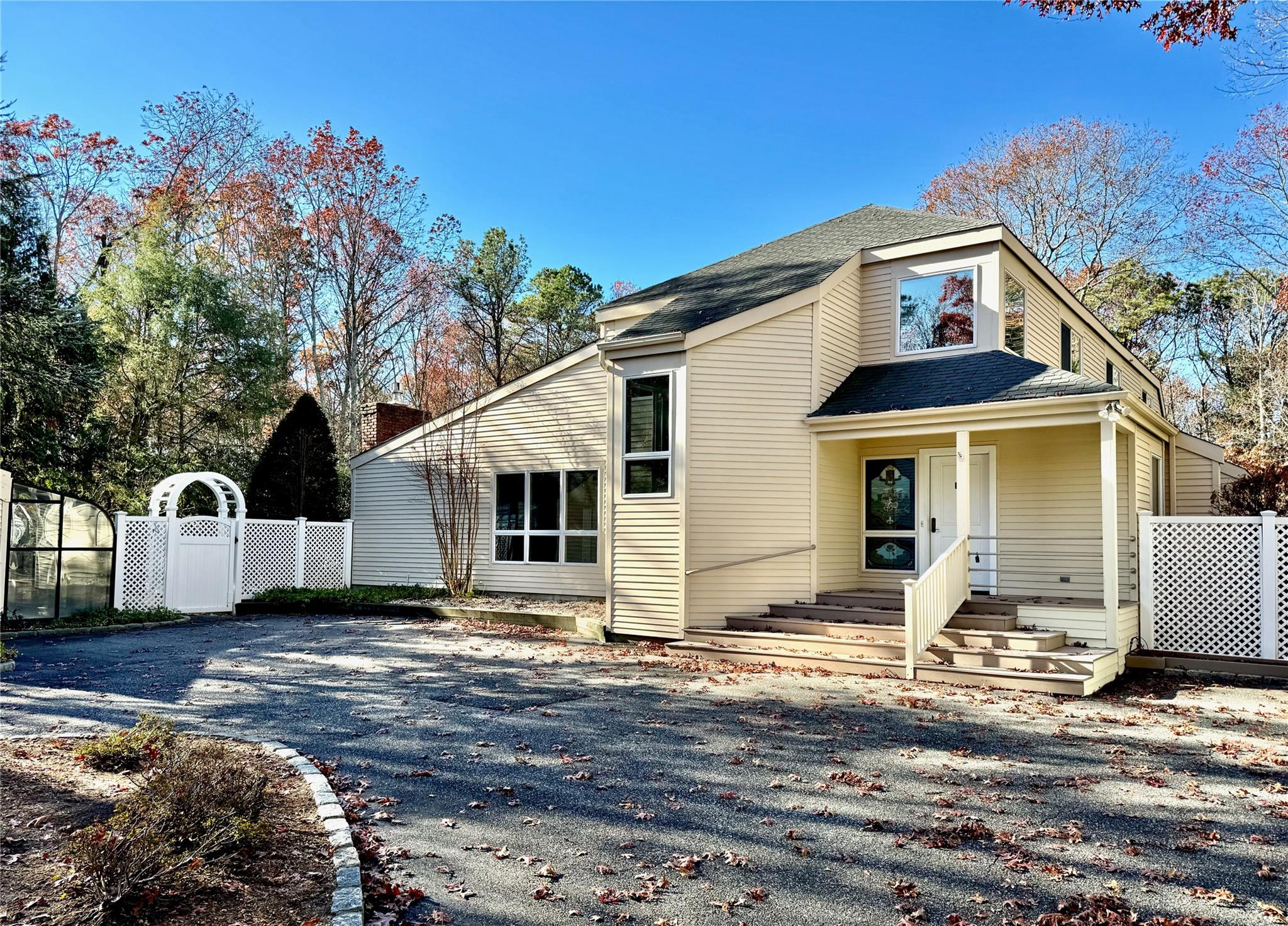 23 Deer Path Quogue, NY 11959 - Photo 1 of 1 a view of a yard in front of house
