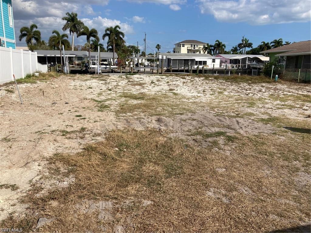 2849 Triggerfish Street Cape Coral, FL 33993 - Photo 1 of 11 a view of houses with outdoor space