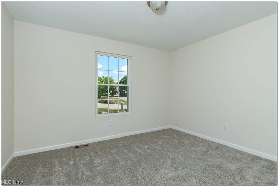 7701 Webster Road Middleburg Heights, OH 44130 - Photo 23 of 29 View of carpeted empty room