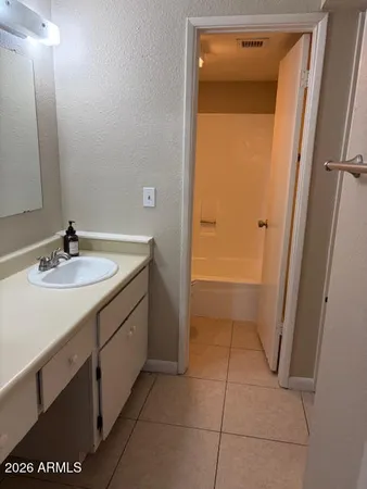 a bathroom with a bathtub and a toilet