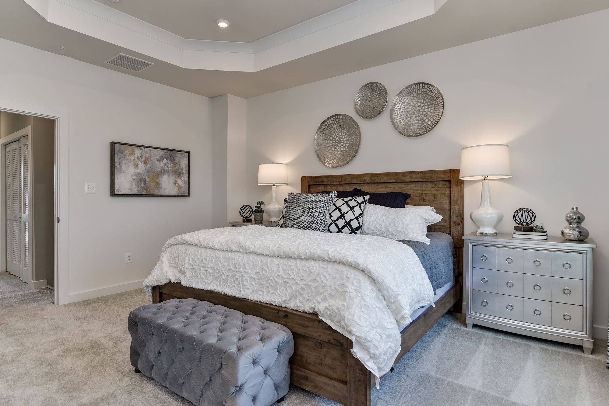 322 Poplar Loop Antioch, TN 37013 - Photo 11 of 20 a bedroom with a bed and painting on the wall