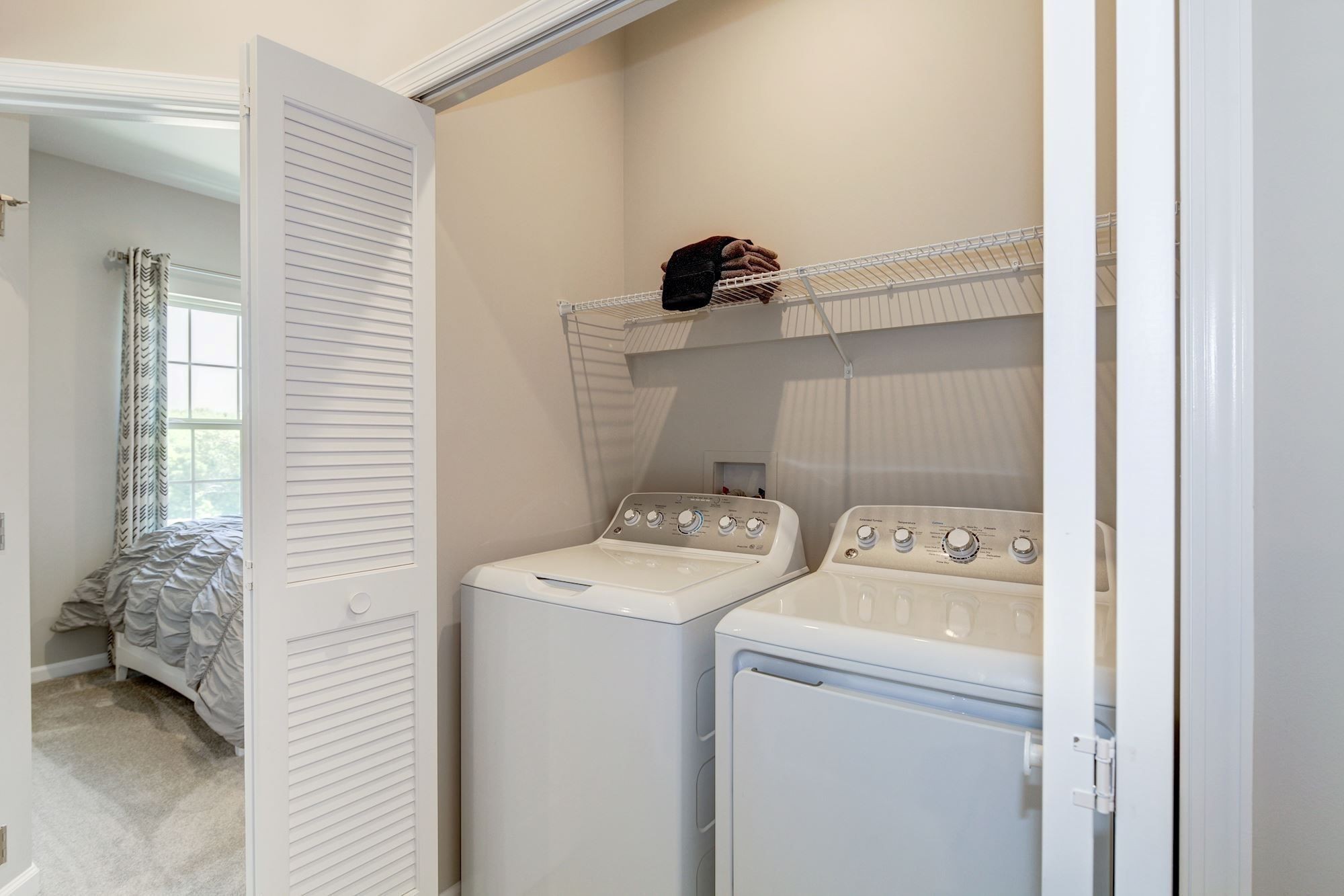 322 Poplar Loop Antioch, TN 37013 - Photo 16 of 20 a utility room with dryer and washer