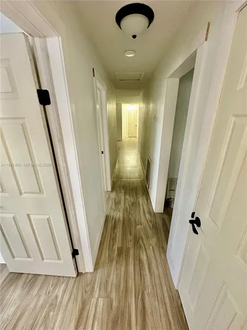a view of entryway with wooden floor
